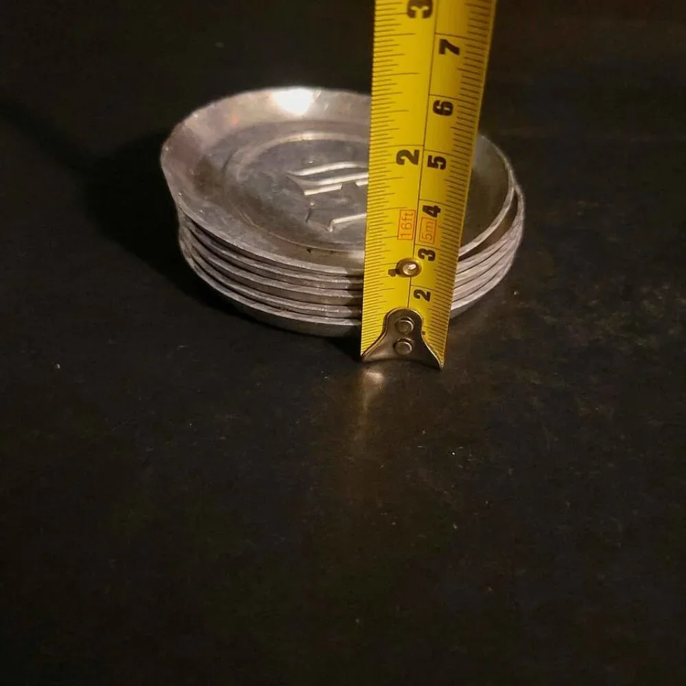 Vintage Aluminum Coasters With An Old English 
